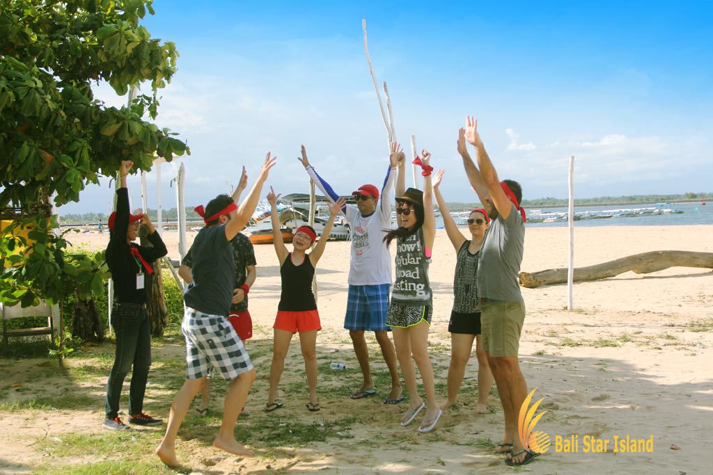 grouping session, cheers, team building, bali beach team building, beach team building