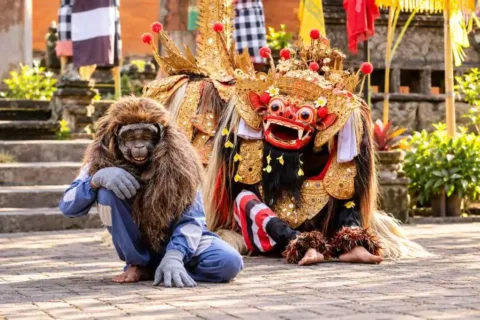 Barong and monkey characters performing in Bali