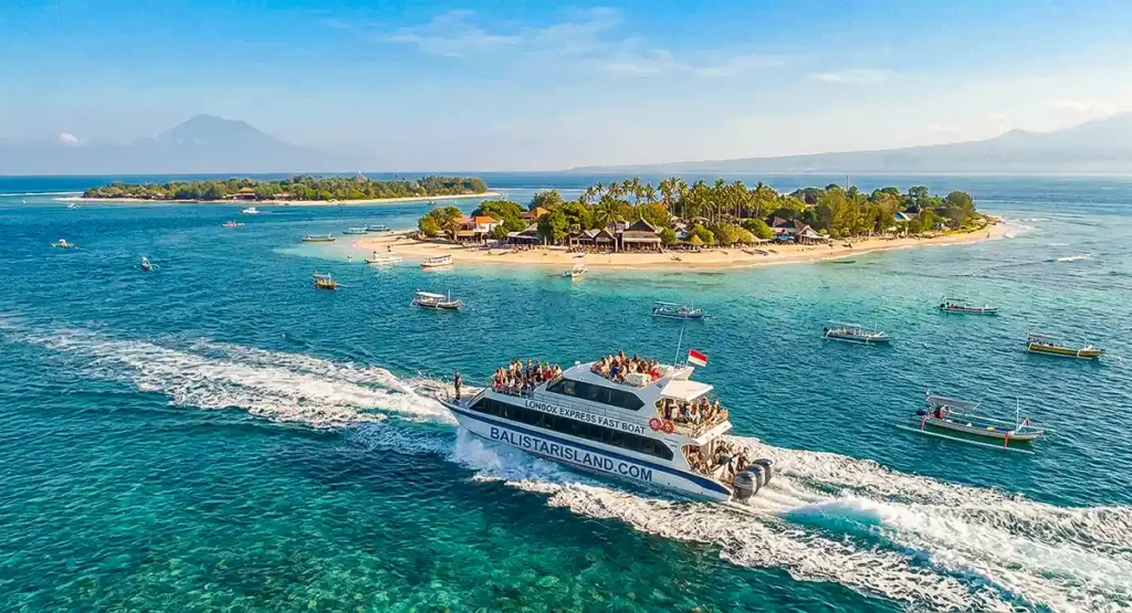 Passenger fast boat Padang Bai to Gili Islands transfer service preparing for departure at Padang Bai harbor.