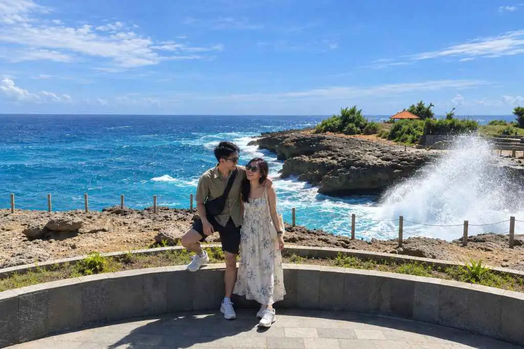 Couple enjoying the coastal scenery and ocean views in Nusa Lembongan
