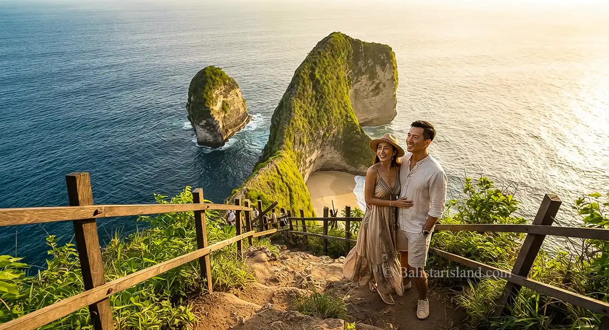 An Asian couple enjoying the view of Kelingking Beach during Nusa Penida and Lembongan Tours.