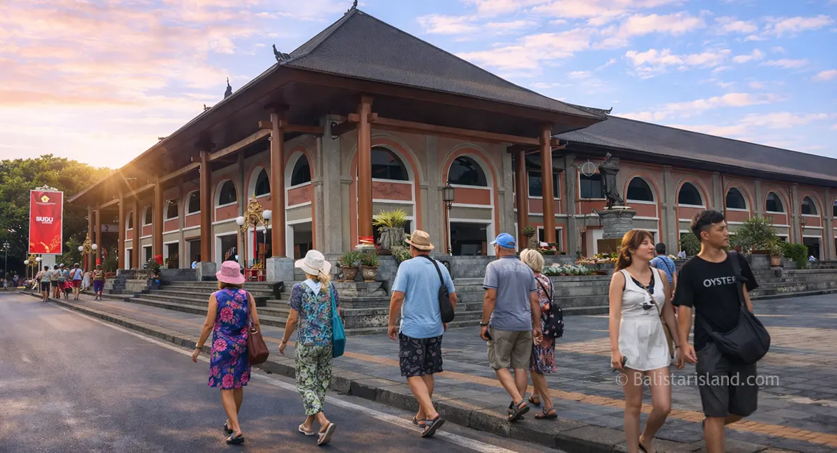 Exterior view of the grand Ubud Art Market building featuring traditional Balinese architectural carvings in Bali.