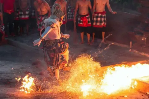 Kecak dance performance with fire and Balinese performers
