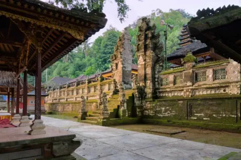 Ancient stone carvings and temple structures at Kehen Temple in Bali