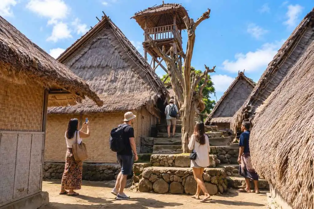 Travelers visiting Sade traditional village to experience Lombok's Sasak culture